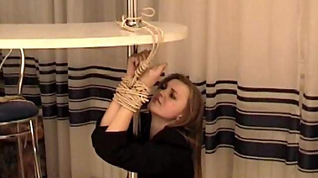 Attractive Russian housewife squirming during some rope play action