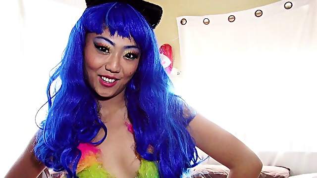 Asian cosplay girl in a blue wig wants dick in her pussy