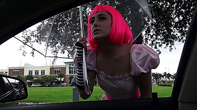 Cosplaying girl with pink hair gets fucked in a car