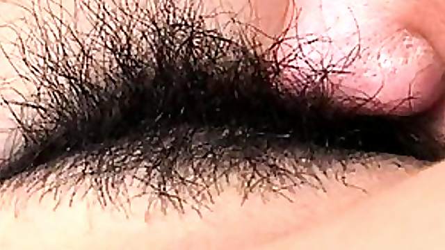 Hitomi Ikeno's hairy pussy gets licked and she moans loudly