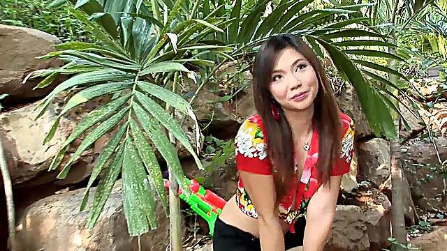 Tantalizing Japanese milf enjoys the good nature while making fin with a dildo