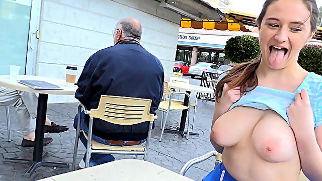 Funny chick likes to flash her tits and ass in public