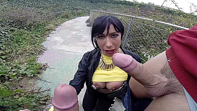 Outdoor threesome with big titty mom sucking two dicks with passion