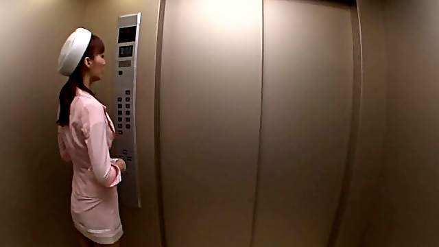Pretty pink skirt suit on the Asian blowing you in an elevator