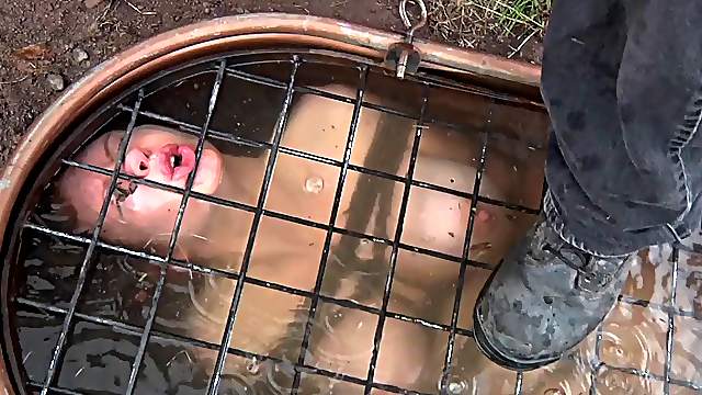 Big booty slave inserted with massive toys outdoor