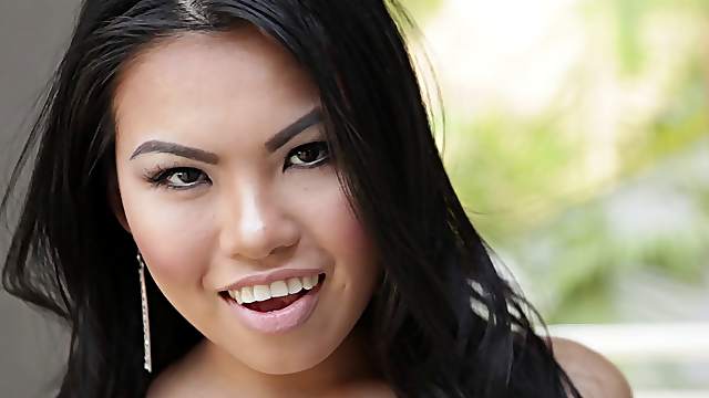 Asian cutie takes the big white dick straight into her inner depths