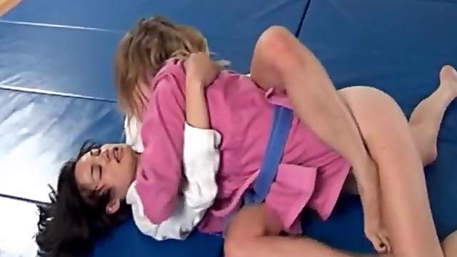 Two naughty wrestler chicks end up licking their twats