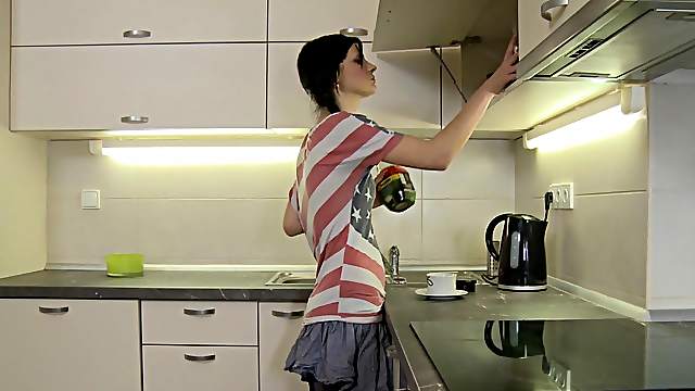 Brunette preparing breakfast then shading miniskirt for hardcore bangs