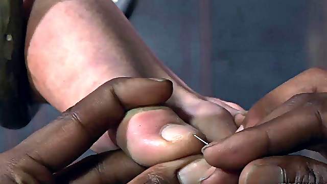 Tortured slave spreading legs seductively in BDSM porn