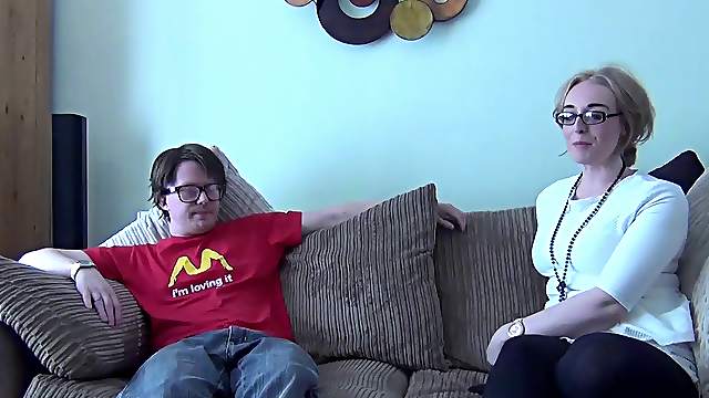 Couple with glasses having an unforgettable cock sucking session
