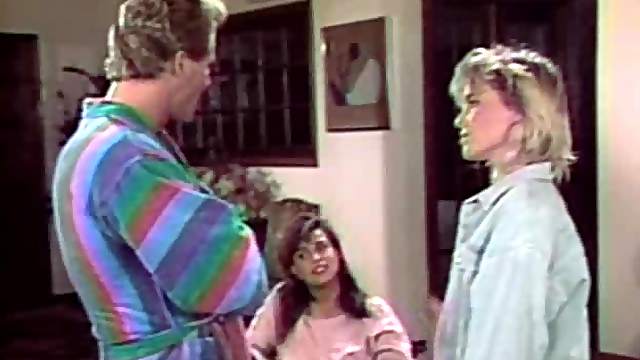 April West has a fun while shagging a fellow in front of a chick
