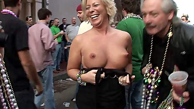 Blonde with a big pair of tits is acting naughty with her friends