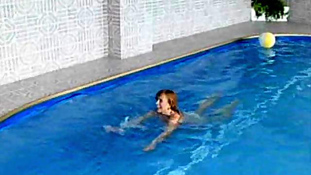 Naked chick seduced by a fellow for a sex at a pool side