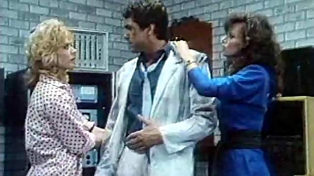 Wild blonde stunner fucking a good-looking dude in a vintage porn clip
