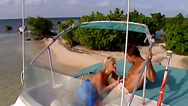 Sandra Russo rides an erected prick on a secluded beach