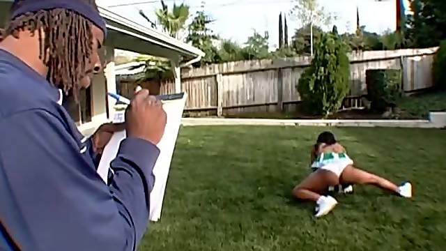 Perky cheerleader Roxy Reynolds handling Byron Long's black tool