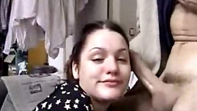 Brunette girl friend sucking the huge cock of her boy friend