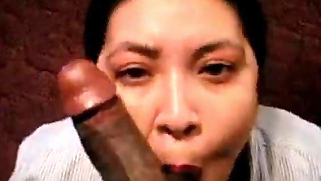 Housewife sucks on a black mans cock