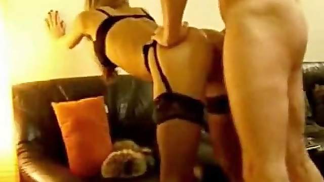 Super sexy blonde bitch clad in sexy black lingerie gets bent over