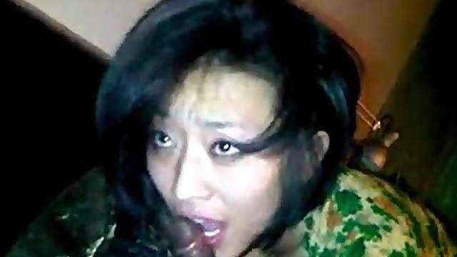 Naughty Vietnamese slut sucks a dark cock