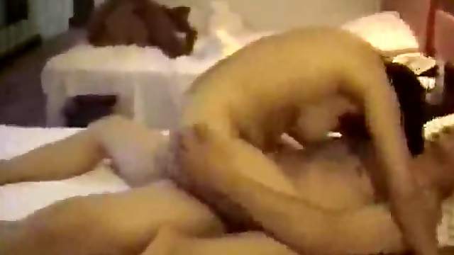 Chinese chick fucking in a hotel room