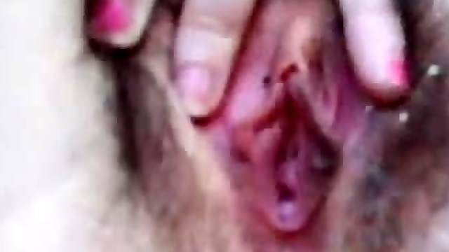 A Hairy Pussy Gets Masturbated In A Close Up Clip