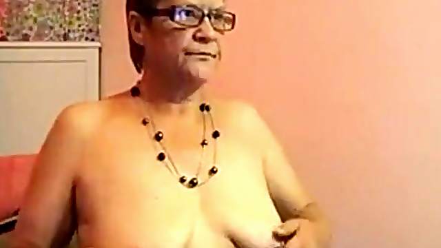 Ugly granny strips naked in front of the webcam