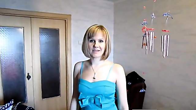 Blonde wife in dress gives a blowjob