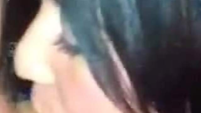 Blue Haired Hottie Sucks Her Man in a Homemade Clip