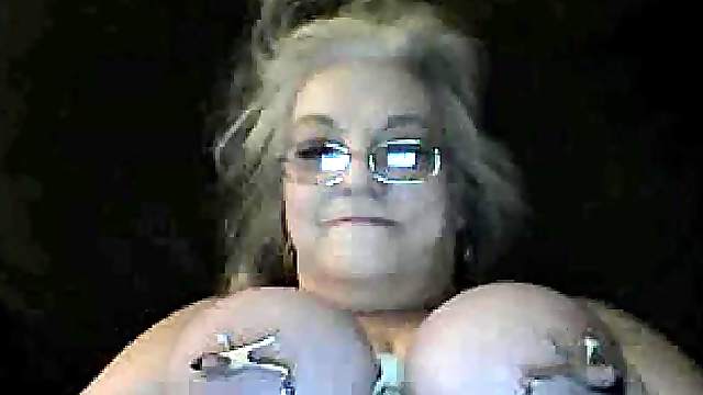 Addicted granny talks dirty in her bedroom