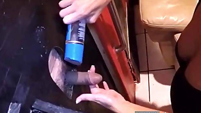 Wifey milking some cocks at the gloryhole