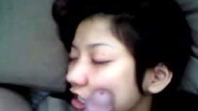 Lovely Asian chick expecting cum on her sweet face