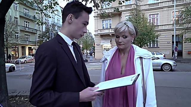 Busty blonde mature Margaux M. picks up a teen guy on the street