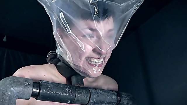 BDSM torture for short haired brunette Kitty Dorian tied to the floor