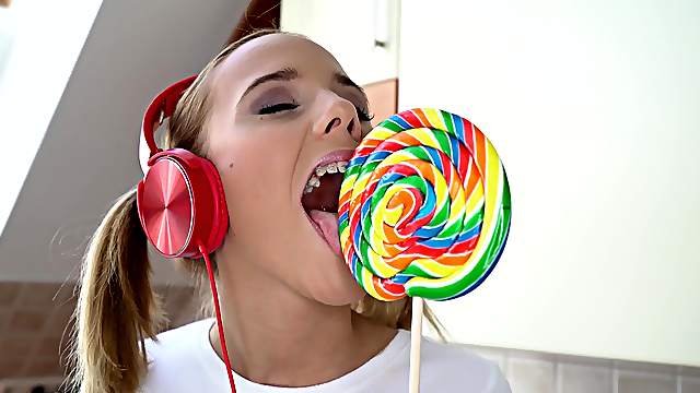 Petite blonde with pigtails Poppy Pleasure gets cum on her pretty face