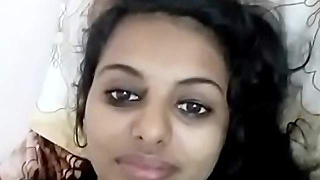 Indian teen beauty lifts up her shirt exposing those perky tits