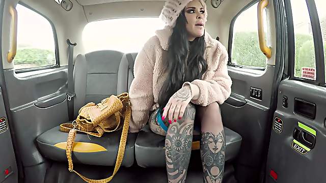 Tattooed Karma Synn enjoys hard sex games with a stranger in the car