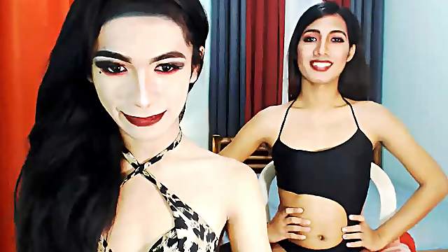 Two hot asian shemales work their asses out on cam.