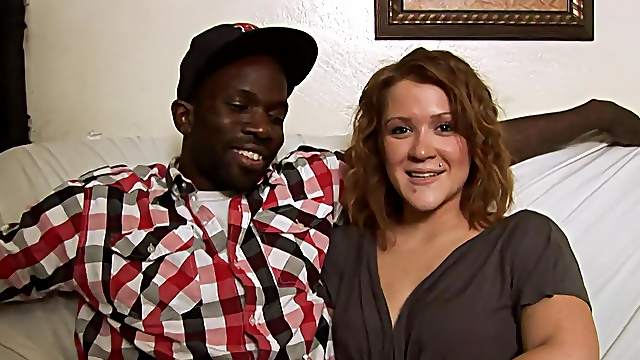 Interracial fucking on the sofa with a BBC and a smiling blonde