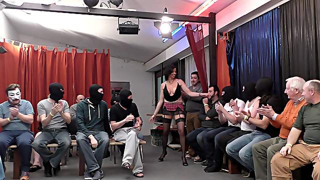 Erotic gangbang between a cock hungry mature and a lot of dudes