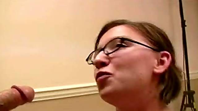 Mistress with glasses swallows
