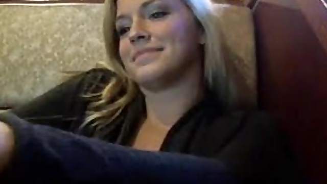 Blonde babe showing tits in cafe