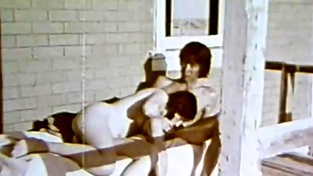Pigtailed Brunette Slut Sucks Cock in a Porch - Vintage Porn Scene