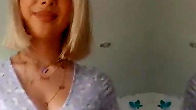 Blonde teen showing summer dressing
