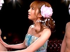 Miku Ohashi sucks two dicks hungrily and gets a mouthful of cum