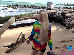 Blonde sweetie Riley Star has a relaxing day on the beach