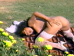 Retro porn video of a brunette chick giving her man a blowjob