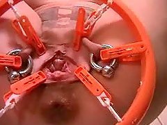 Soft pussy enjoys some double fisting in a hot BDSM