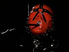 Lesbian Latex Dominatrices Humiliate a Submissive Male