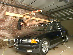 Mika Tan gets lies on a car hood and gets punished